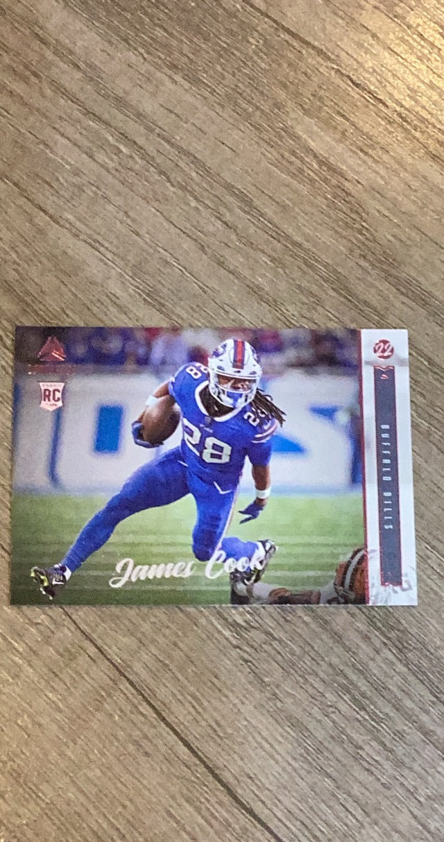 James Cook 2022 Panini Chronicles - Luminance Update Rookies Pink 221 trading card image front