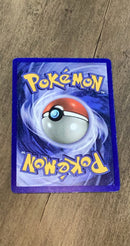 Machop 1999 Base Set 052/102 trading card image rear