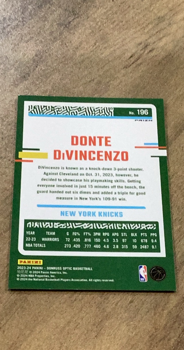 Donte DiVincenzo 2023-24 Donruss Optic - Holo 196 trading card image rear