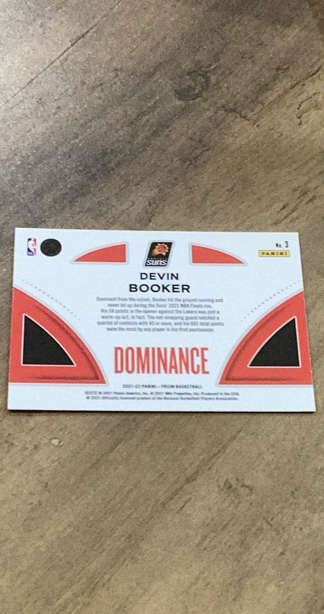 Devin Booker 2021-22 Panini Prizm - Dominance 3 trading card image rear