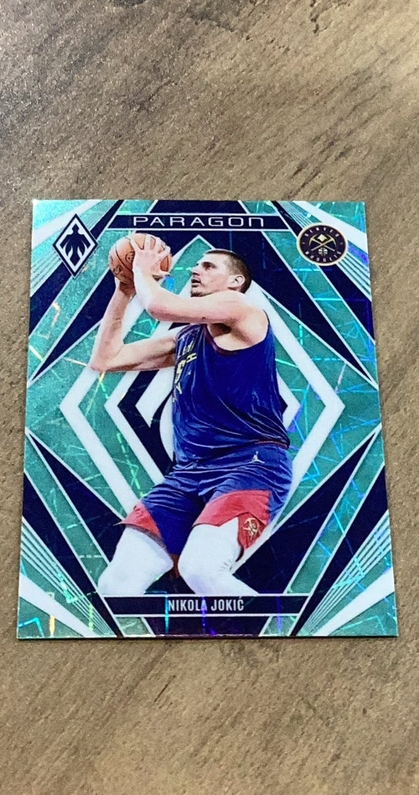 Nikola Jokic 2023-24 Panini Phoenix - Phoenix Teal Lazer 6 trading card image front