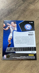 Tyrese Maxey 2023-24 Panini Revolution - Winter 66 trading card image rear
