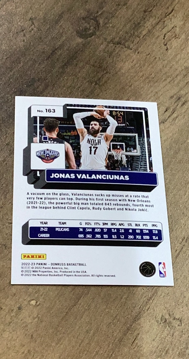 Jonas Valanciunas 2022-23 Panini Donruss - Holo Laser Green 163 trading card image rear