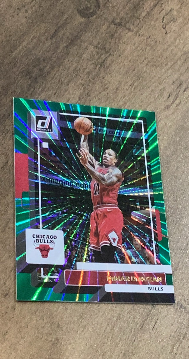 DeMar DeRozan 2022-23 Panini Donruss - Holo Laser Green 31 trading card image front