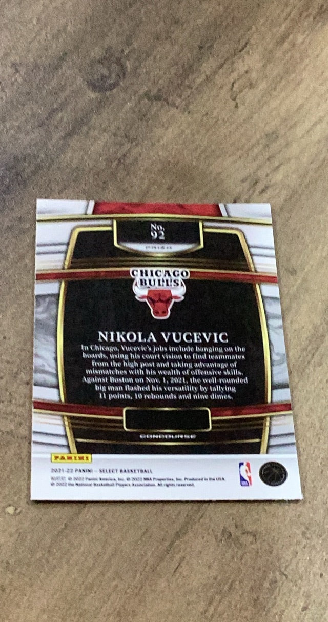 Nikola Vucevic 2021-22 Panini Select - Green White Purple Prizms 92 trading card image rear