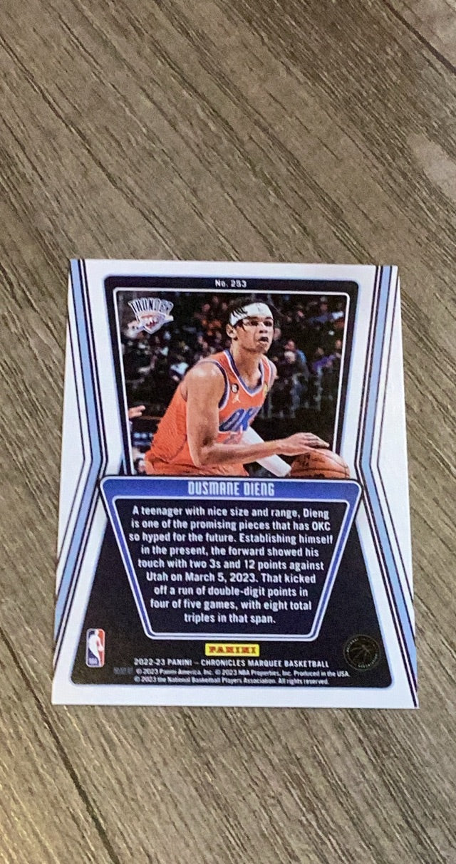 Ousmane Dieng 2022-23 Panini Chronicles Marquee 253 trading card image rear