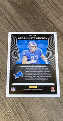 Aidan Hutchinson 2022 Panini Illusions - Trophy Collection Emerald 29 trading card image rear
