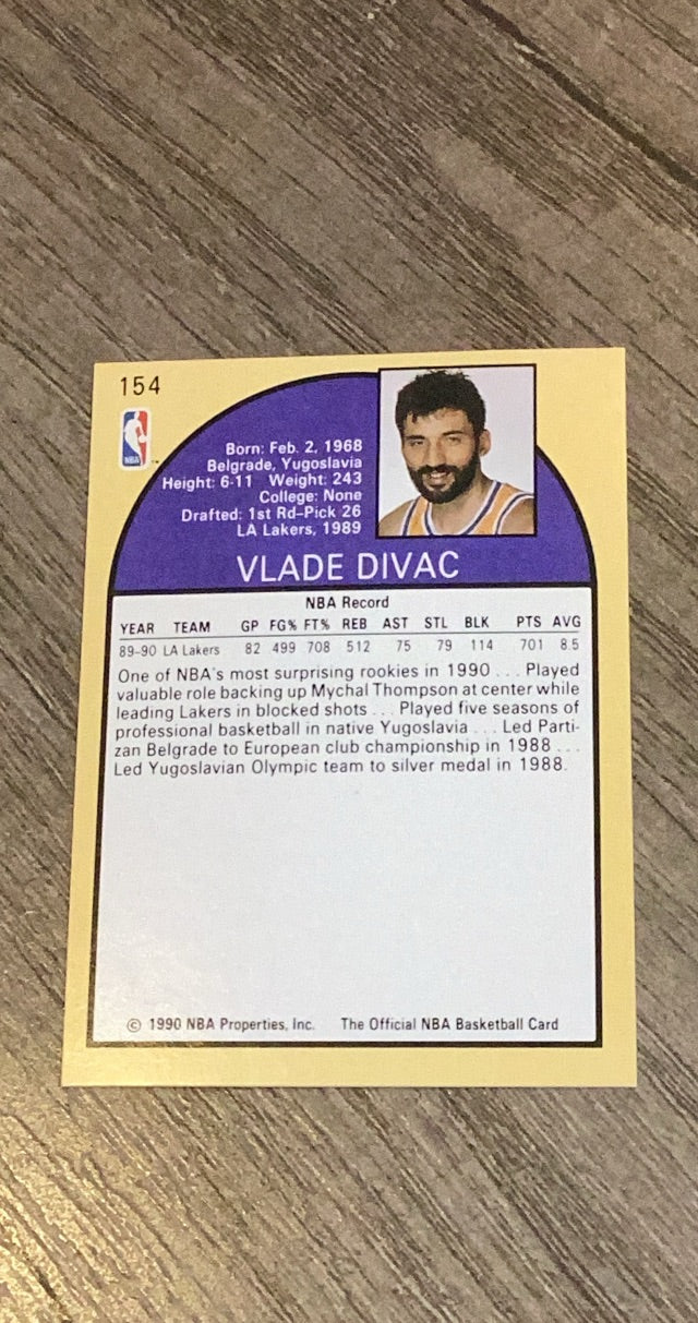 Vlade Divac 1990 Hoops 154 trading card image rear