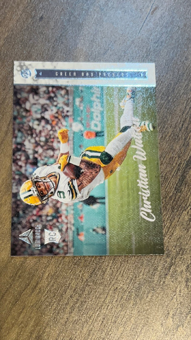 Christian Watson 2022 Panini Chronicles - Luminance Update Rookies 222 trading card image front