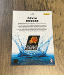 Devin Booker 2022-23 Donruss Optic - Splash! 12 trading card image rear