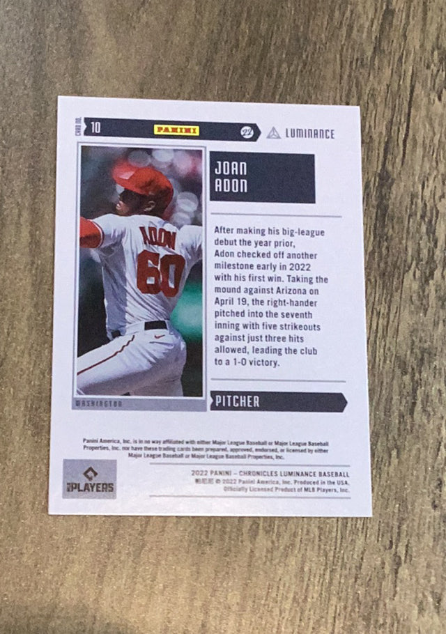 Joan Adon 2022 Panini Chronicles - Luminance 10 trading card image rear