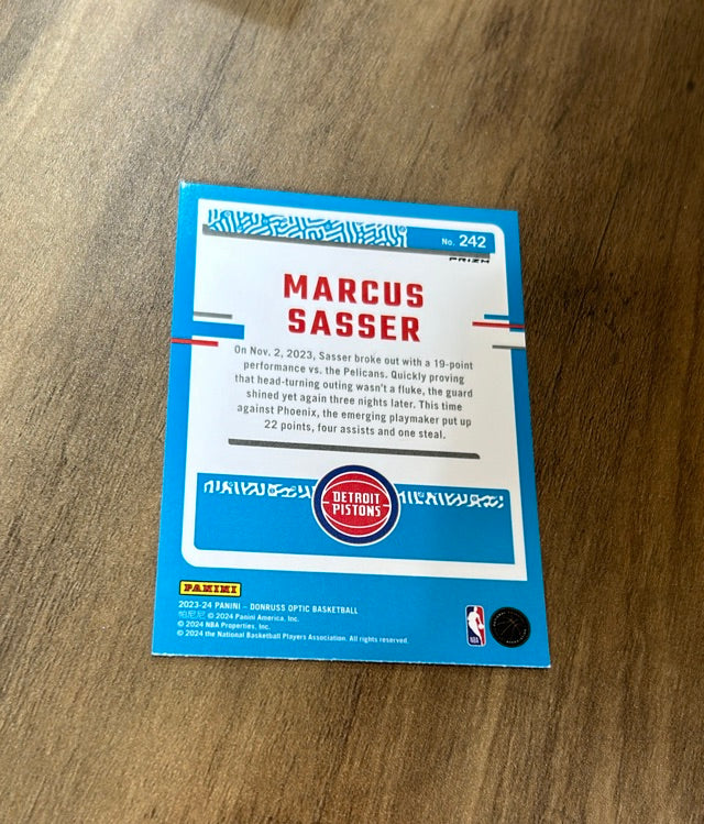 Marcus Sasser 2023-24 Donruss Optic - Holo 242 trading card image rear