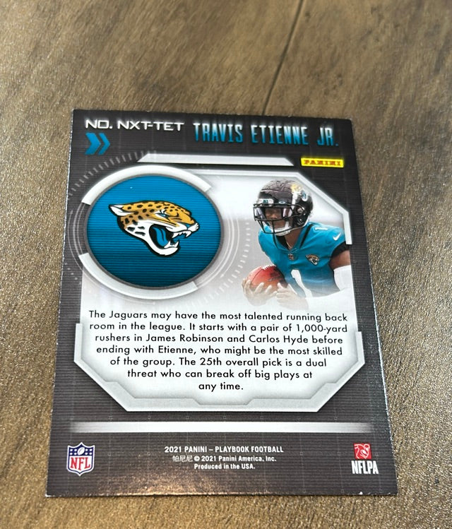 Travis Etienne Jr. 2021 Panini Playbook - Next Up NXT-TET trading card image rear