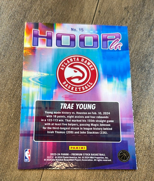 Trae Young 2023-24 Hoops Premium Stock Hoopla 15 trading card image rear