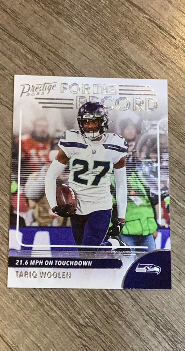 Tariq Woolen 2023 Panini Prestige For the Record trading card image front